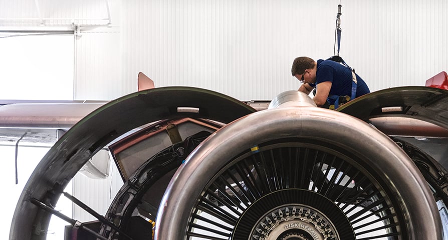 Mechanic working on aircraft