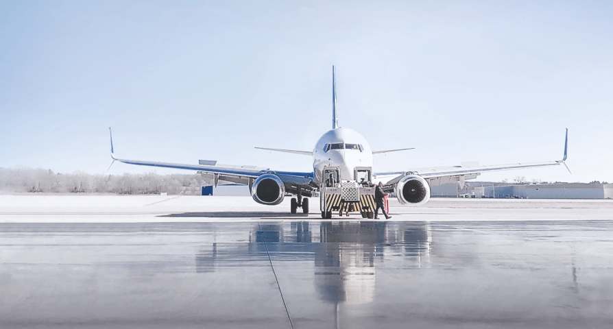 Airplane on a runway on a sunny day