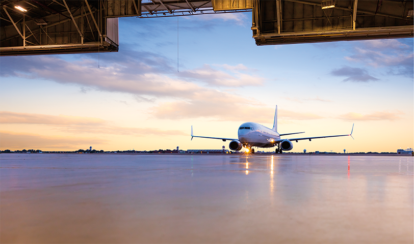 Airplane entering hangar