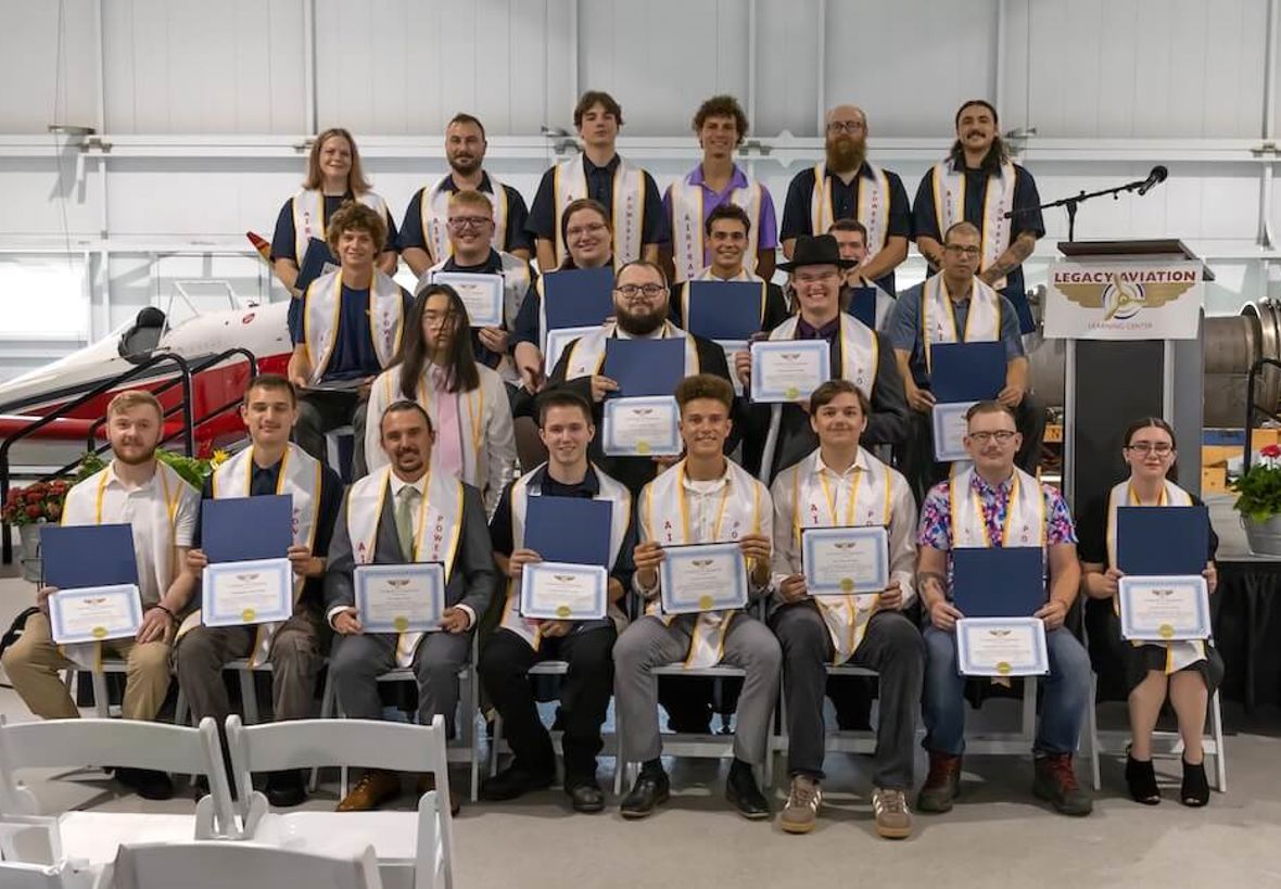  Legacy Aviation graduates celebrate the completion of their Airframe and Powerplant program on August 8, 2025, in Traverse City, Michigan