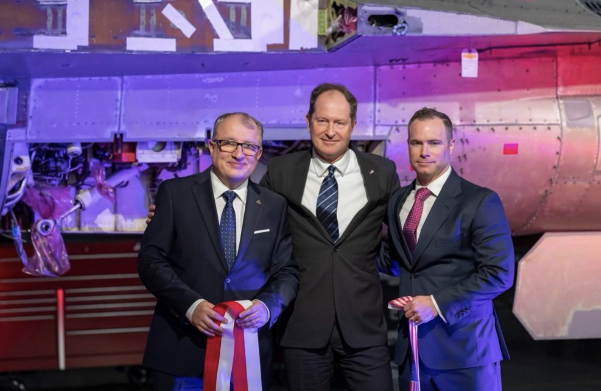 Piotr Skrzyński, President of WZL-2; Mark Brzezinski, U.S. Ambassador to Poland; and Jay Pereira, General Manager of Government Programs for AAR Piotr Skrzyński, President of WZL-2; Mark Brzezinski, U.S. Ambassador to Poland; and Jay Pereira, General Manager of Government Programs for AAR