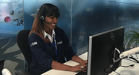 Customer support employee at her computer