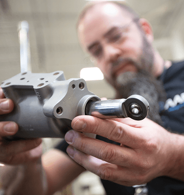 mechanic working on an airplane part