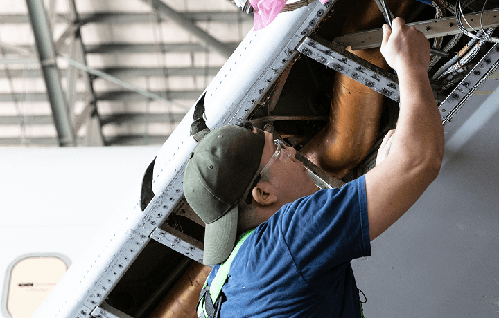 Mechanic working on an engine