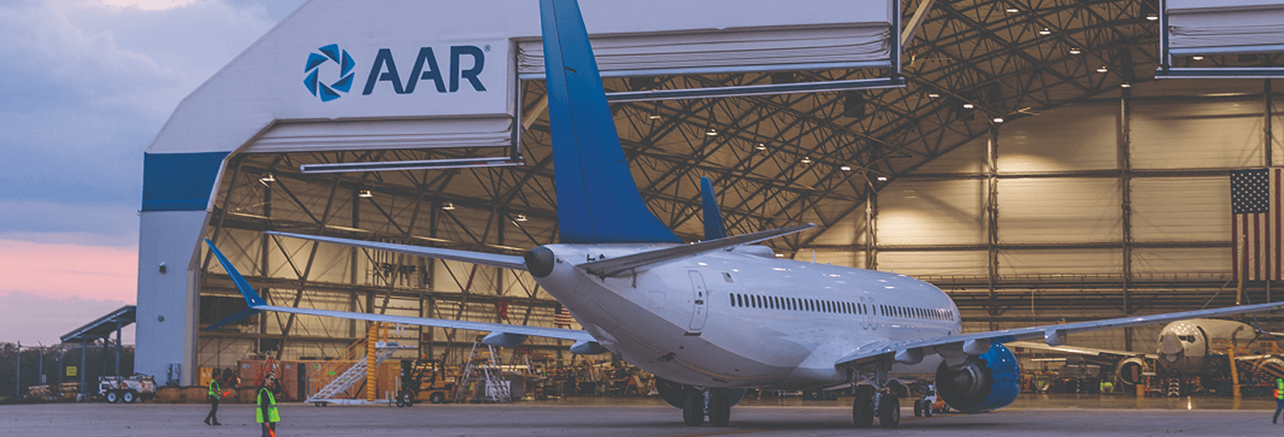 Airplane in front of AAR hangar