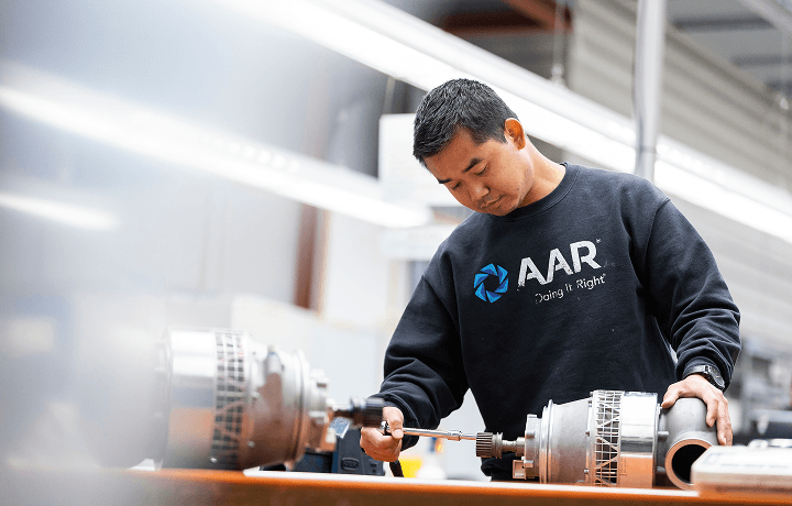 Technician working on a part
