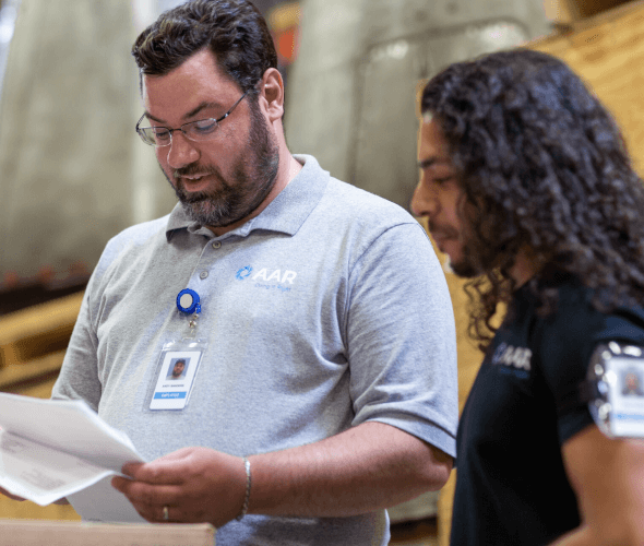 Employees working together in an hangar