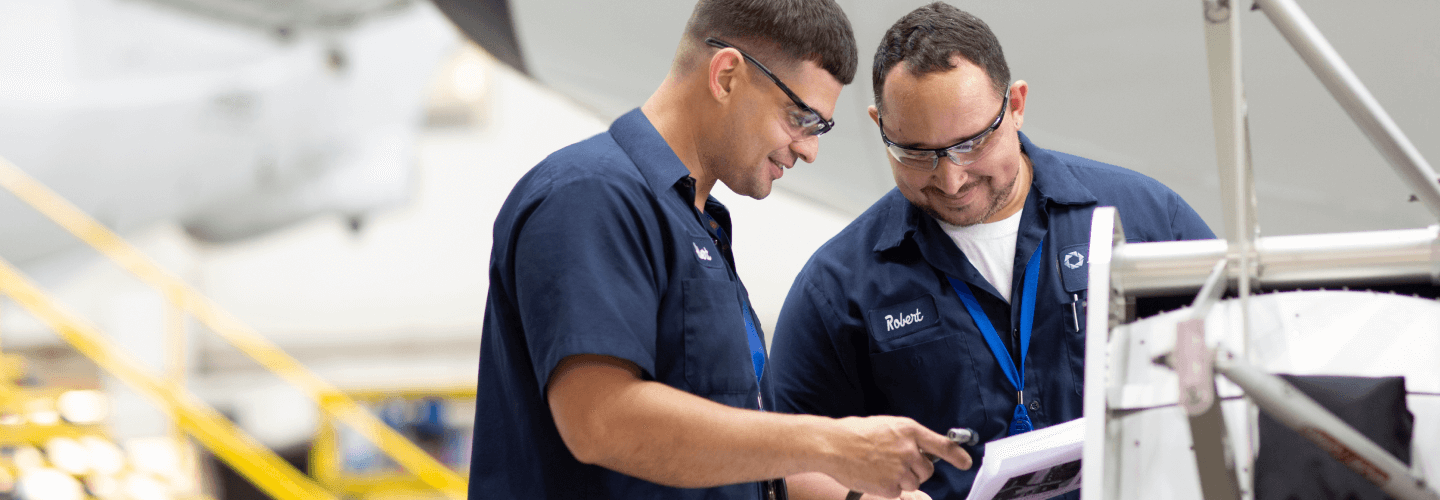 Employees working together Employees working together
